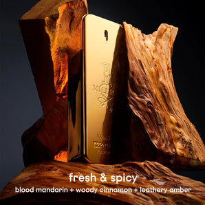 Gold bar with branding on a wooden background, labeled 'fresh & spicy' with notes on ingredients. Perfume