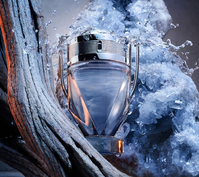 Perfume bottle with ice and water elements