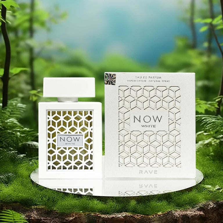 White perfume bottle and packaging with 'NOW' branding on a natural background