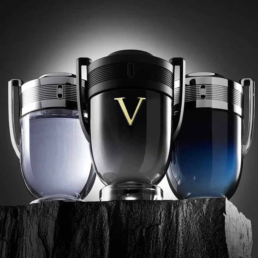 Three cosmetic jars with a prominent 'V' logo on a dark background. Perfume