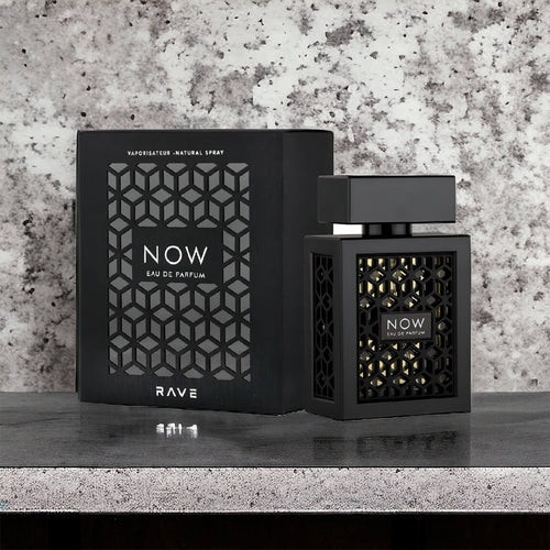Black 'NOW' Eau de Parfum bottle and packaging on a textured surface with a gray background
