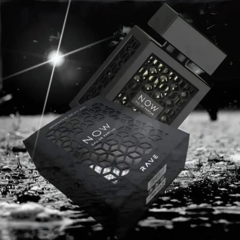 Black and white image of 'NOW' product packaging on a textured surface with a bright light source.