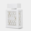 White decorative lantern with geometric pattern on a light gray background