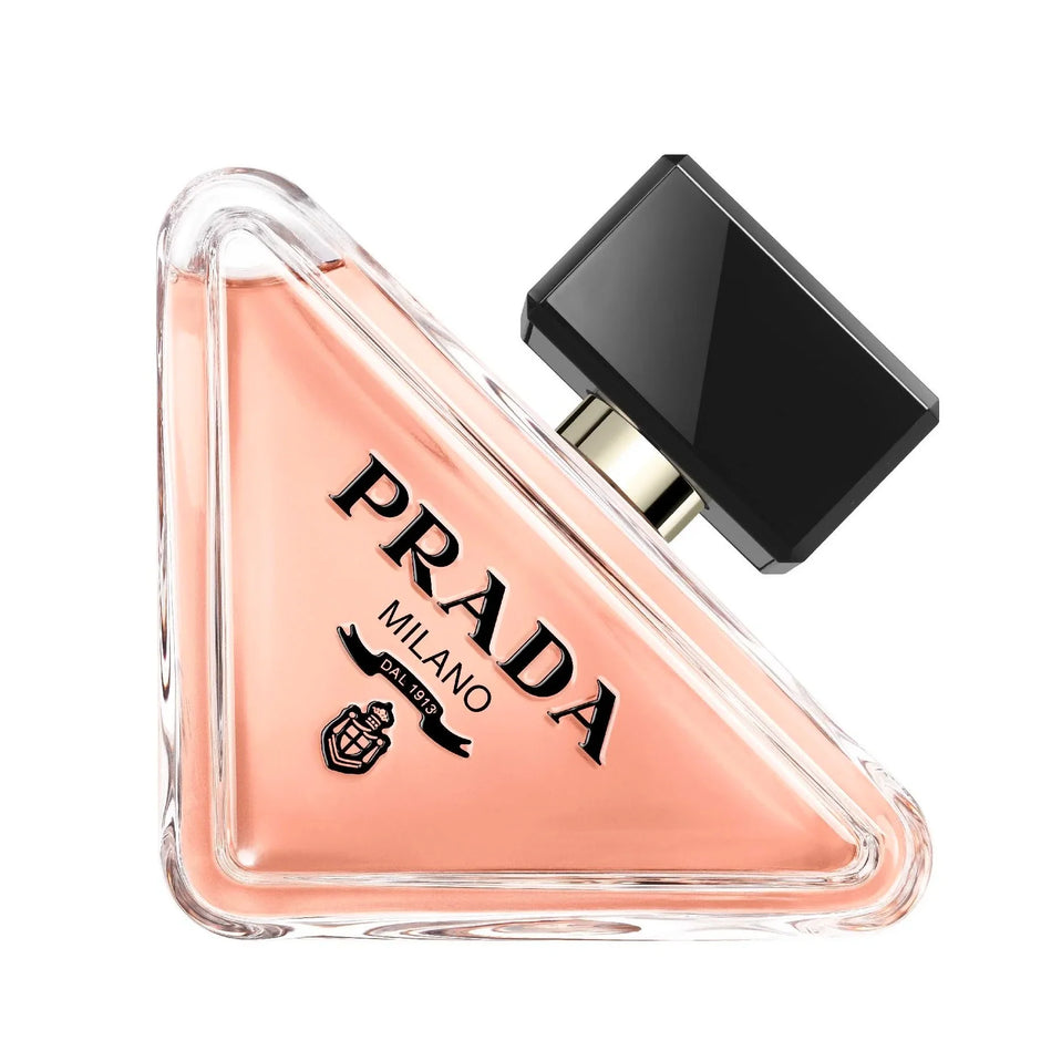 Prada perfume bottle with a black cap on a white background