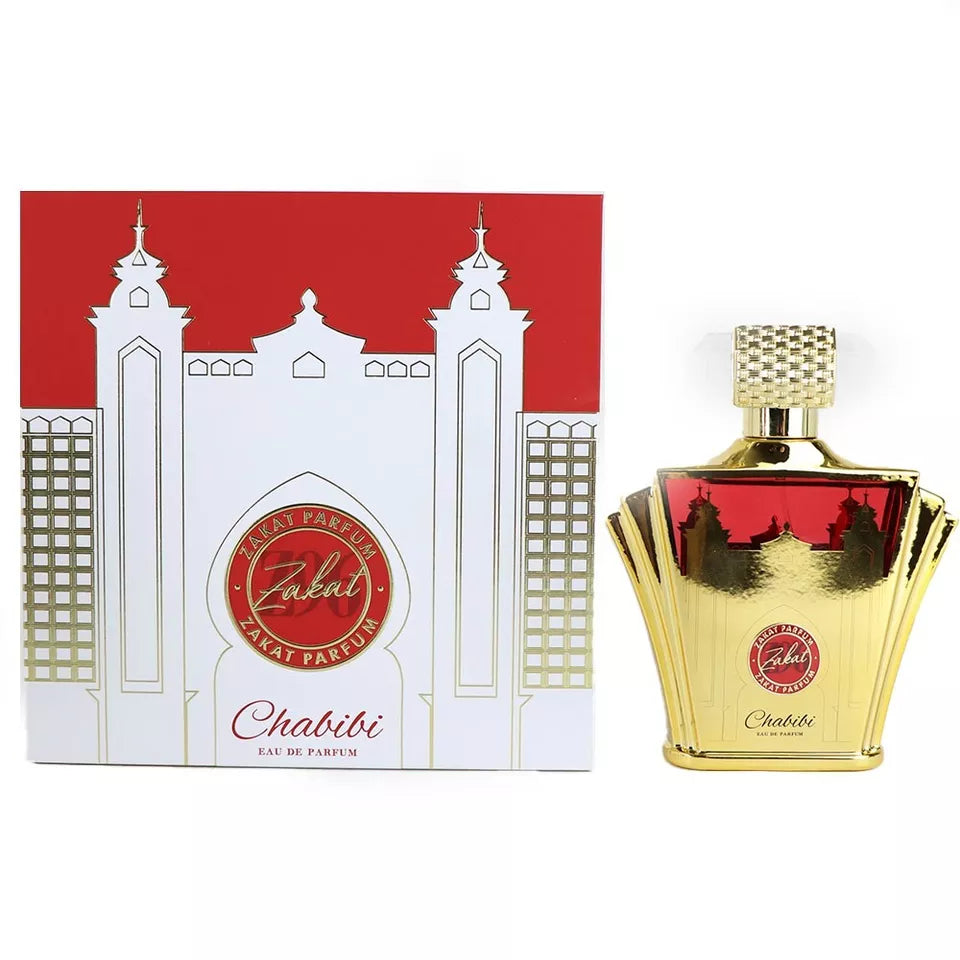 Gold perfume bottle with red label and matching box featuring architectural design on a white background. 