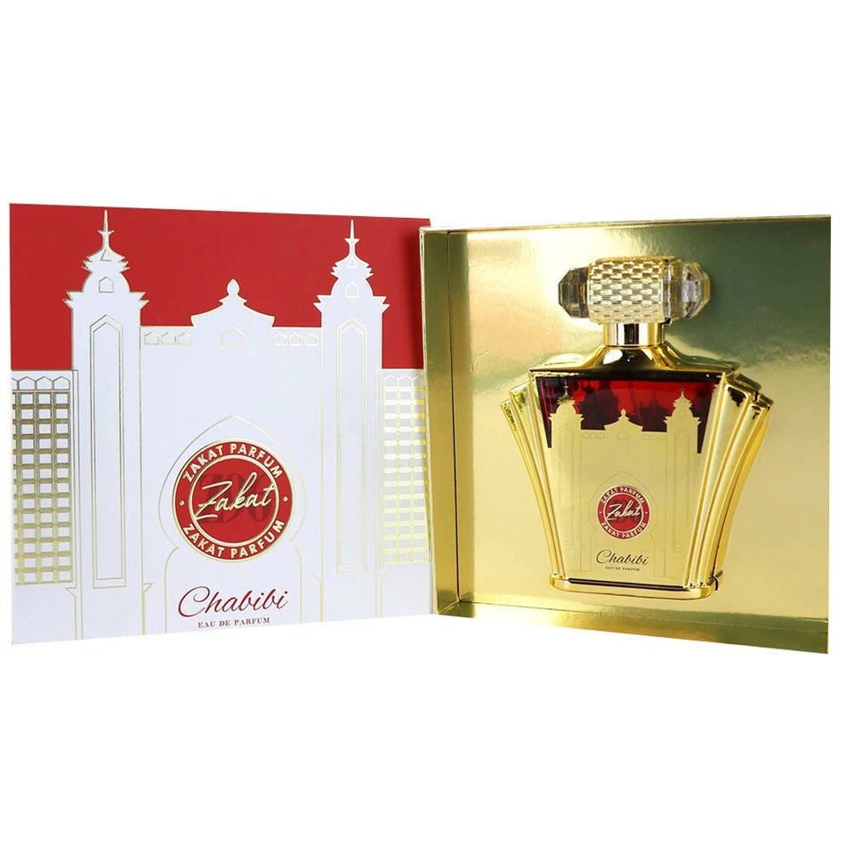 Gold Zalat Chabibi perfume bottle with packaging on a white background
