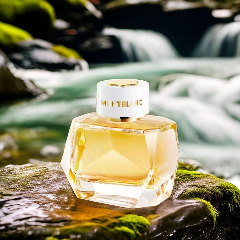 Perfume bottle with 'Montblanc' branding on a natural background