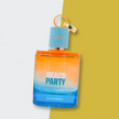 Perfume bottle labeled 'Beach Party' with a gradient design on a two-tone background